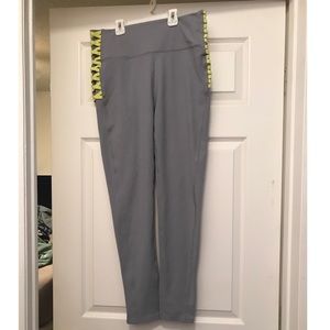 Gray leggings with neon yellow accent